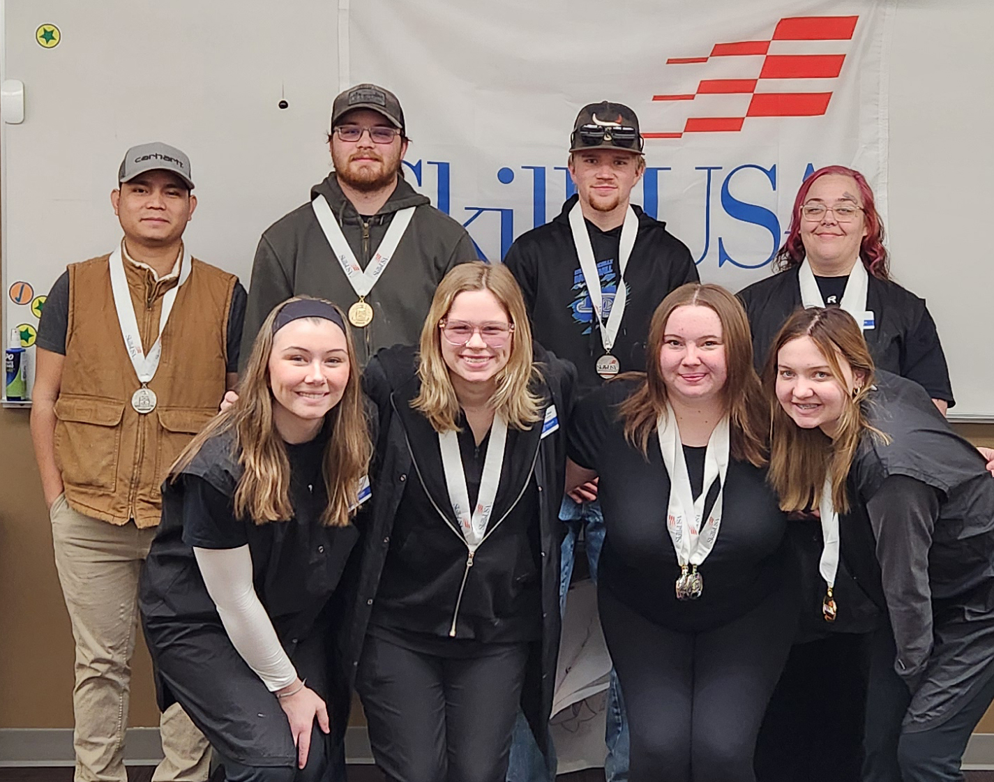 Photo of SkillsUSA winners posing in two rows.